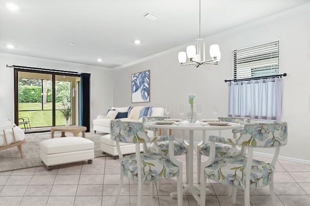 dining room with a chandelier, light tile patterned floors, and crown molding