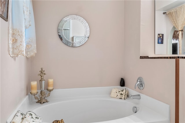 bathroom featuring a tub