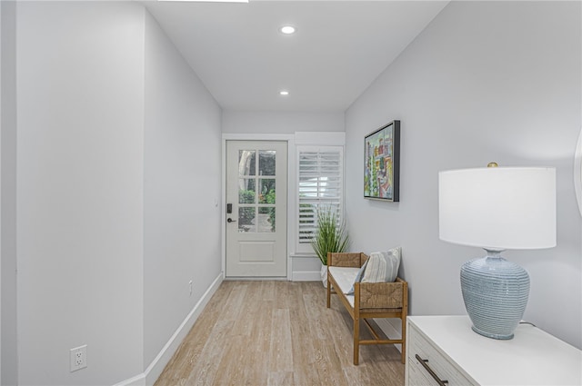 entryway with light hardwood / wood-style floors