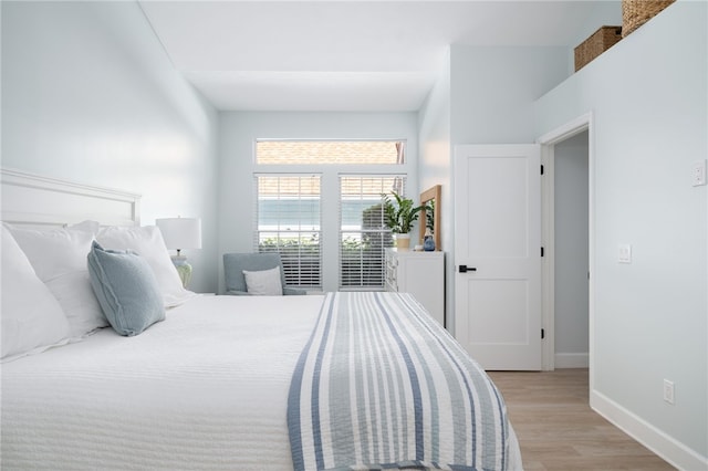 bedroom featuring light hardwood / wood-style floors