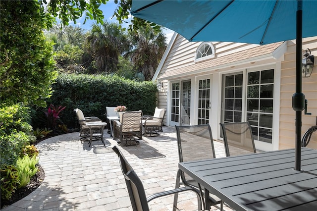 view of patio featuring french doors