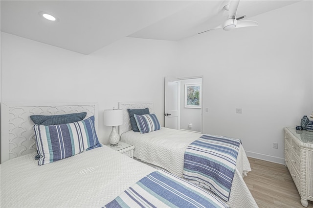 bedroom featuring ceiling fan and light wood-type flooring