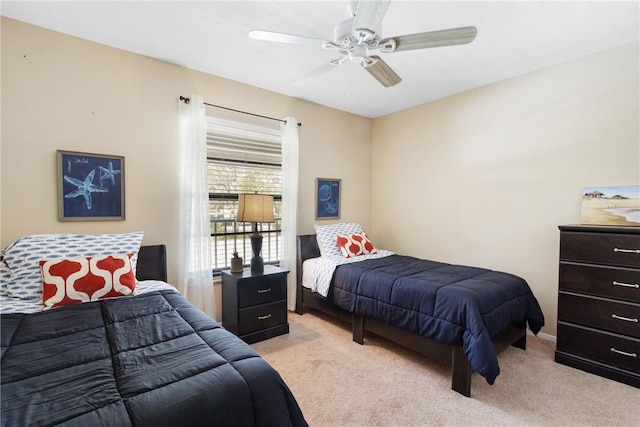 41 Plantation Dr Unit 202, Vero Beach, FL 32966 - bedroom featuring light carpet and a ceiling fan