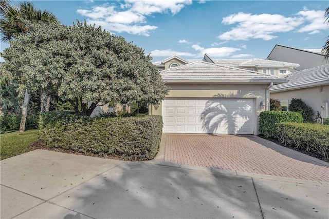 view of front of home with a garage