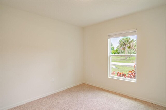 1580 Eastlake Ln, Sebastian, FL 32958 - unfurnished room with light carpet and baseboards