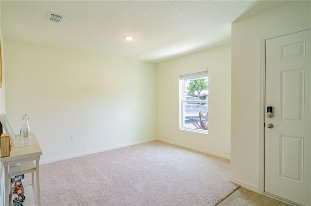 1580 Eastlake Ln, Sebastian, FL 32958 - spare room with light carpet and baseboards