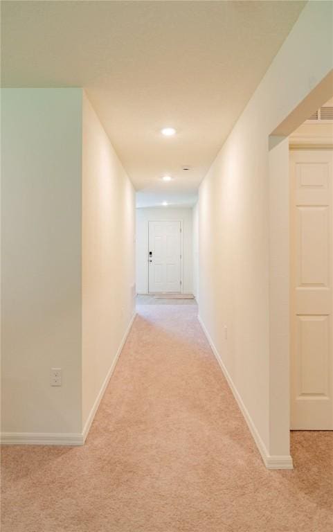 1580 Eastlake Ln, Sebastian, FL 32958 - hallway with light carpet, baseboards, and recessed lighting