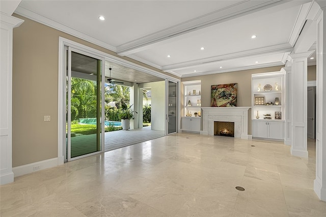 unfurnished living room featuring ornate columns, ornamental molding, ceiling fan, beam ceiling, and built in features