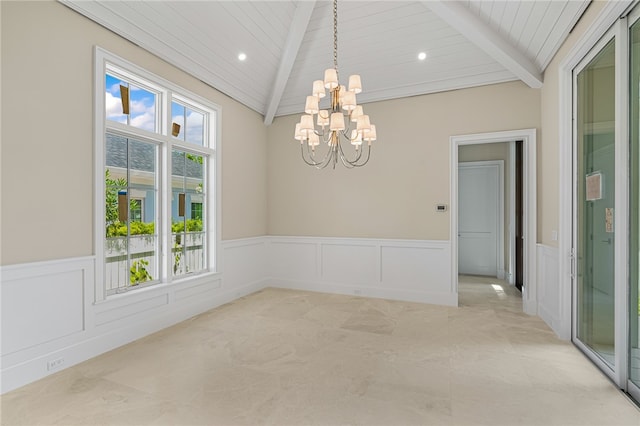 spare room with vaulted ceiling with beams, wooden ceiling, and an inviting chandelier