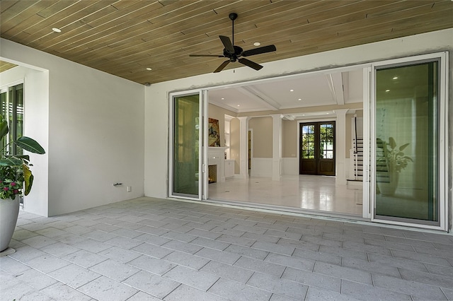 view of patio with french doors and ceiling fan