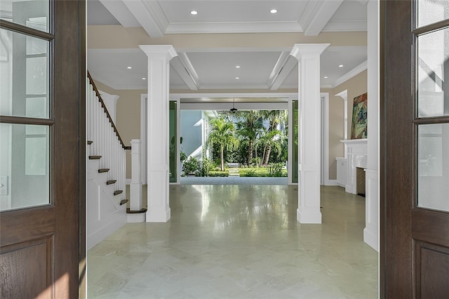 entryway featuring ornamental molding, beamed ceiling, and ornate columns