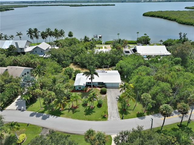 drone / aerial view with a water view