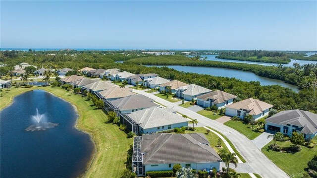 9266 Orchid Cove Cir, Vero Beach, FL 32963 - aerial view of residential area with a large body of water