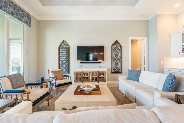 9266 Orchid Cove Cir, Vero Beach, FL 32963 - living room with wood finished floors and crown molding
