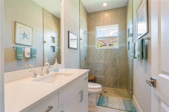 9266 Orchid Cove Cir, Vero Beach, FL 32963 - bathroom with vanity and a stall shower