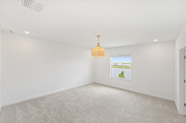 3544 Angler Dr, Fort Pierce, FL 34946 - empty room with light colored carpet and recessed lighting