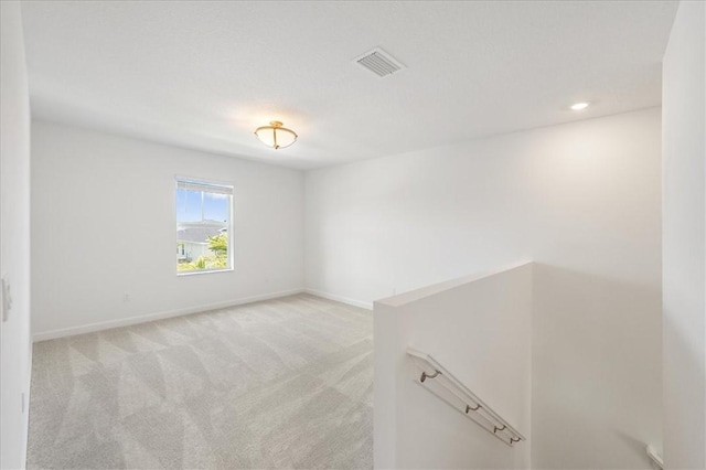 3544 Angler Dr, Fort Pierce, FL 34946 - empty room featuring light colored carpet and recessed lighting