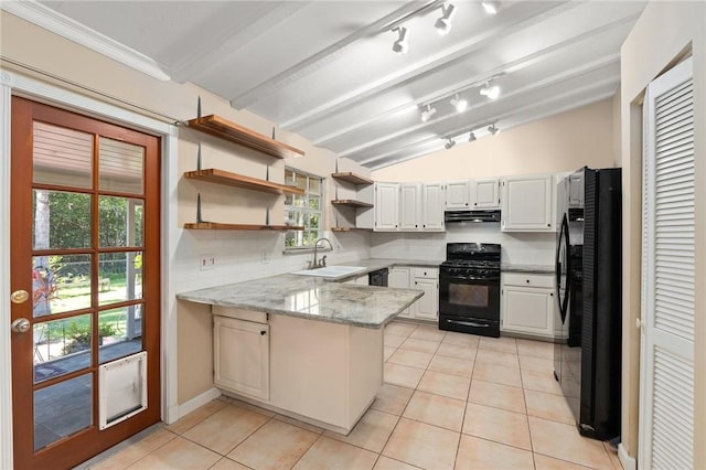 kitchen featuring black appliances, tasteful backsplash, sink, kitchen peninsula, and lofted ceiling with beams