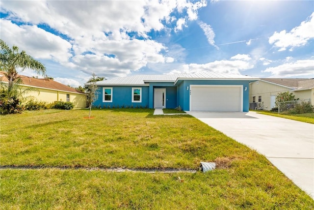 ranch-style home featuring a garage and a front yard