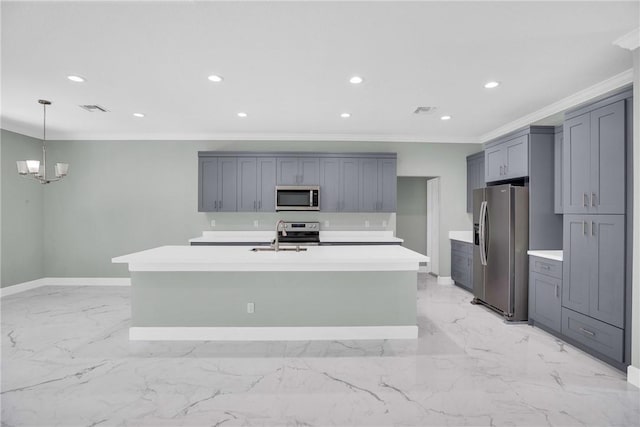 kitchen featuring gray cabinetry, decorative light fixtures, sink, and appliances with stainless steel finishes