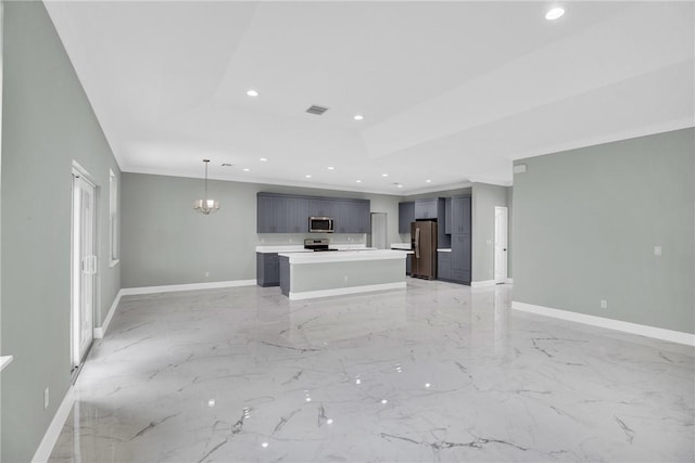 unfurnished living room with a notable chandelier