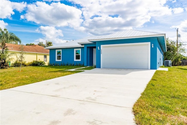 single story home with central air condition unit, a front yard, and a garage