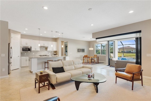 living room with light tile patterned floors