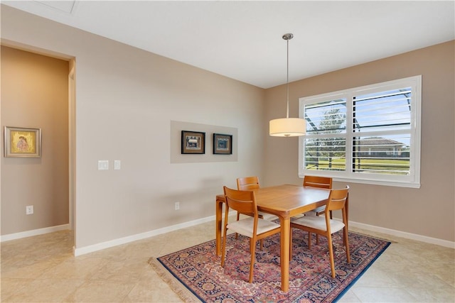 dining room with light tile patterned floors