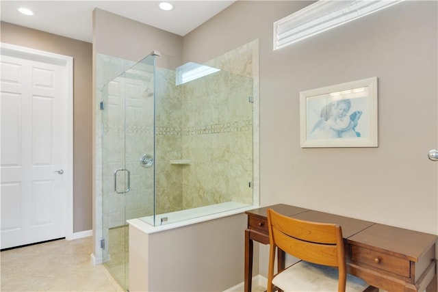 bathroom featuring a shower with door