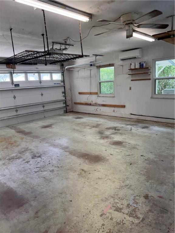 2525 84th Ter, Vero Beach, FL 32966 - garage with a wall unit AC and ceiling fan