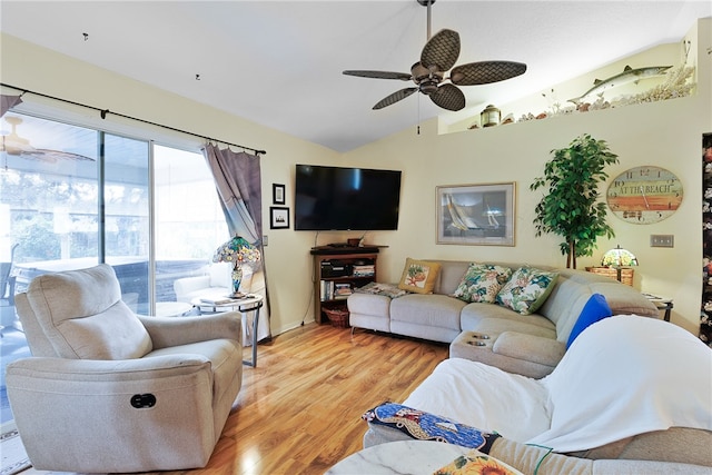 living room featuring light hardwood / wood-style floors, ceiling fan, and lofted ceiling