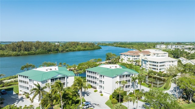 drone / aerial view with a water view