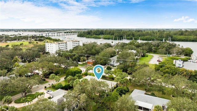 birds eye view of property featuring a water view