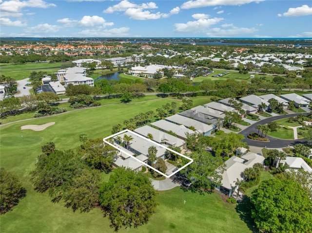 bird's eye view with golf course view and a residential view