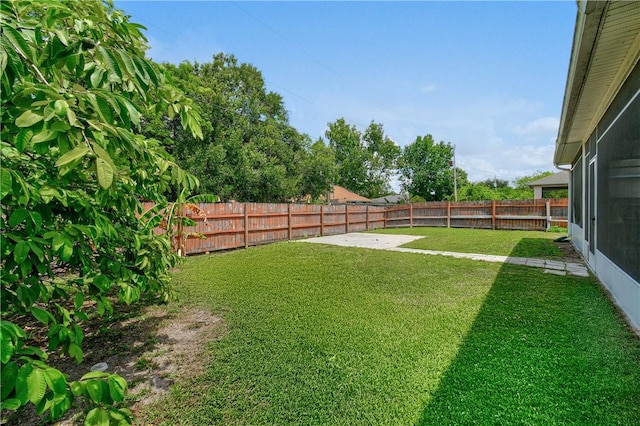 8365 104th Ct, Vero Beach, FL 32967 - fenced backyard featuring a patio