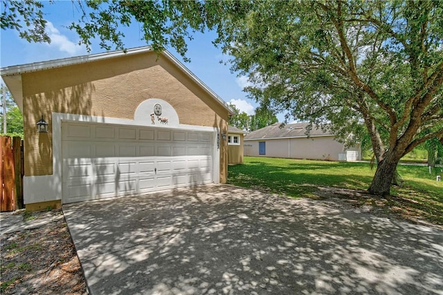 8365 104th Ct, Vero Beach, FL 32967 - garage with concrete driveway