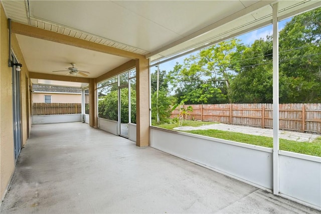 8365 104th Ct, Vero Beach, FL 32967 - unfurnished sunroom with a ceiling fan