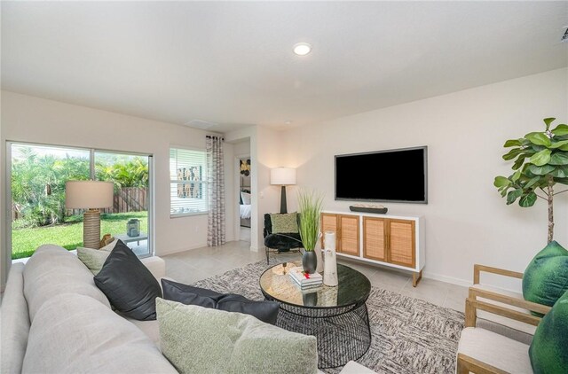 502 Saunders St, Sebastian, FL 32958 - living area with light tile patterned floors and recessed lighting