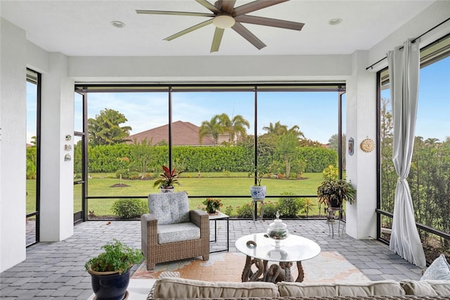 8280 Halbert Ln, Vero Beach, FL 32968 - sunroom / solarium featuring a ceiling fan and healthy amount of natural light