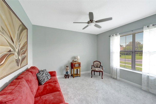 8280 Halbert Ln, Vero Beach, FL 32968 - living area featuring baseboards, ceiling fan, and carpet floors