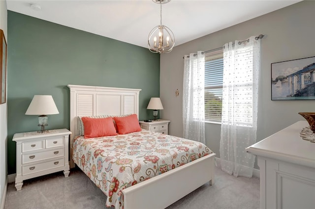 8280 Halbert Ln, Vero Beach, FL 32968 - bedroom featuring light carpet, a chandelier, and baseboards