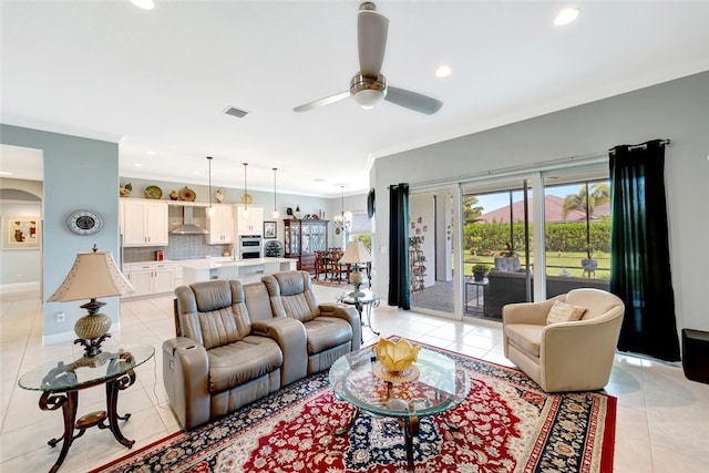 8280 Halbert Ln, Vero Beach, FL 32968 - living room featuring light tile patterned floors, recessed lighting, a ceiling fan, and ornamental molding