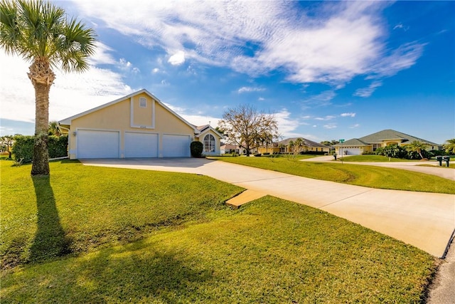 exterior space with a garage and a front yard