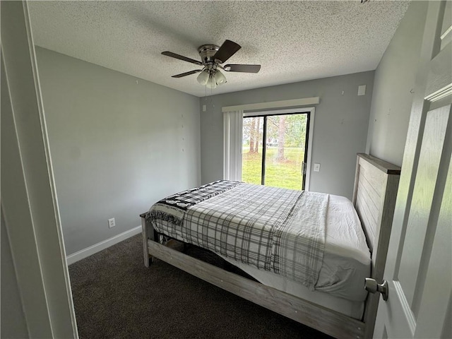 2890 1st Pl, Vero Beach, FL 32968 - carpeted bedroom featuring access to outside, a ceiling fan, baseboards, and a textured ceiling