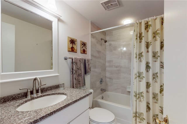 full bathroom featuring toilet, vanity, and shower / tub combo with curtain