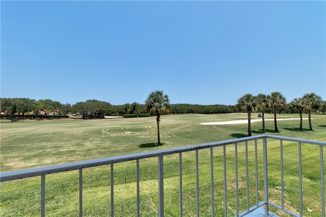 view of yard featuring a balcony