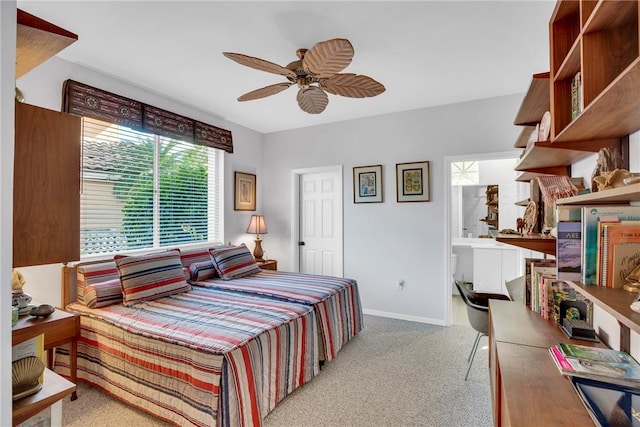 bedroom featuring light carpet, ceiling fan, and baseboards