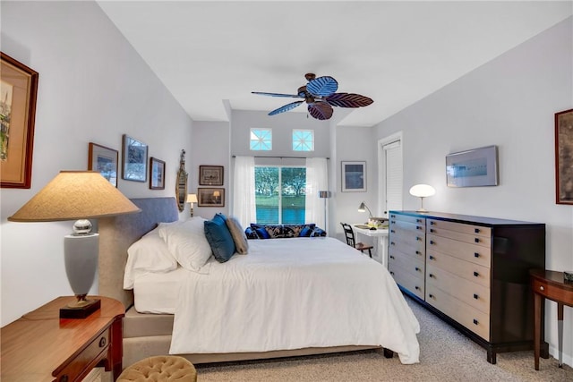 carpeted bedroom featuring a ceiling fan