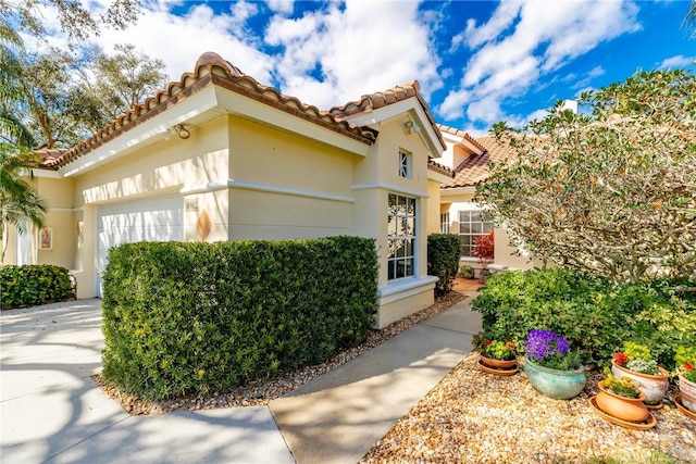 view of home's exterior featuring a garage