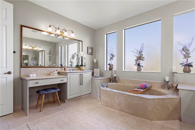 bathroom with vanity, tiled bath, and tile patterned floors